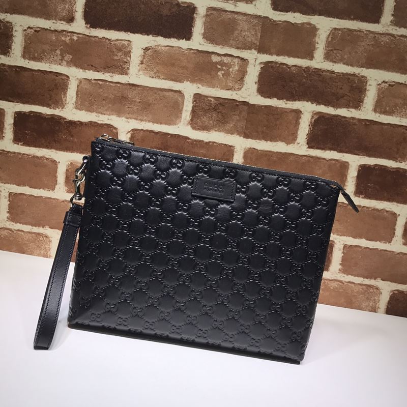 G*u*i clutch bags